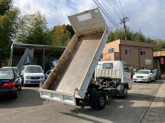 エルフトラック ダンプ　５速マニュアル　ディーゼル　２ｔ積み　リアＷタイヤ　エンジン型式４ＢＥ１　極東開発ＤＤ０２０８　荷台内寸４６９×１６９×１９７　走行９６４００ｋｍ　３人乗り（15枚目）