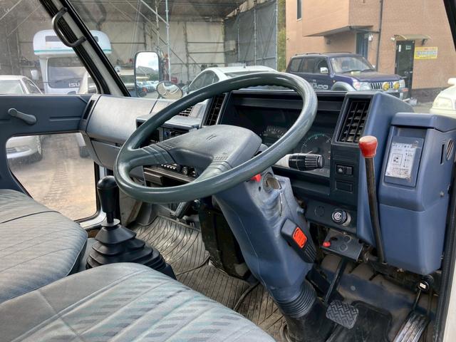 エルフトラック ダンプ　５速マニュアル　ディーゼル　２ｔ積み　リアＷタイヤ　エンジン型式４ＢＥ１　極東開発ＤＤ０２０８　荷台内寸４６９×１６９×１９７　走行９６４００ｋｍ　３人乗り（37枚目）