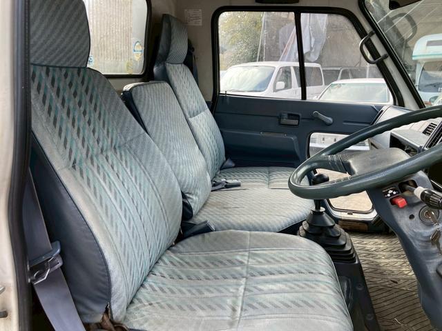 エルフトラック ダンプ　５速マニュアル　ディーゼル　２ｔ積み　リアＷタイヤ　エンジン型式４ＢＥ１　極東開発ＤＤ０２０８　荷台内寸４６９×１６９×１９７　走行９６４００ｋｍ　３人乗り（43枚目）