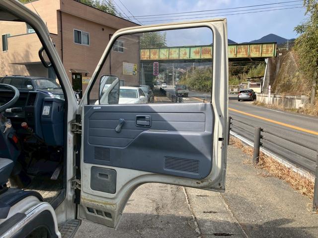 エルフトラック ダンプ　５速マニュアル　ディーゼル　２ｔ積み　リアＷタイヤ　エンジン型式４ＢＥ１　極東開発ＤＤ０２０８　荷台内寸４６９×１６９×１９７　走行９６４００ｋｍ　３人乗り（45枚目）