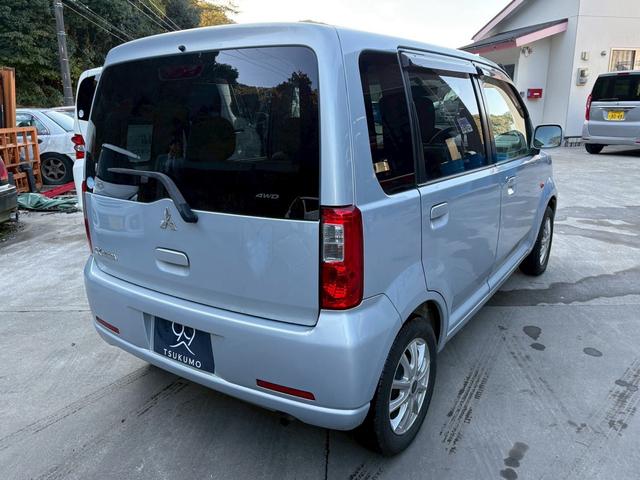 eKワゴン M 4WD/シートヒーター/キーレスエントリー/アルミホイール/ETC/CD再生/パワーステアリング/マニュアル5速(6枚目)