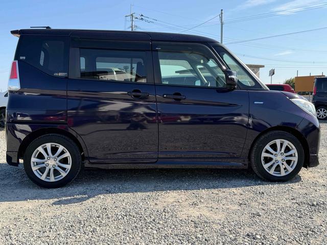 ソリオ ハイブリッドＭＺ　ＥＴＣ　バックカメラ　オートクルーズコントロール　レーンアシスト　衝突被害軽減システム　両側電動スライドドア　オートライト　ＨＩＤ　スマートキー　アイドリングストップ　シートヒーター　ウォークスルー（17枚目）