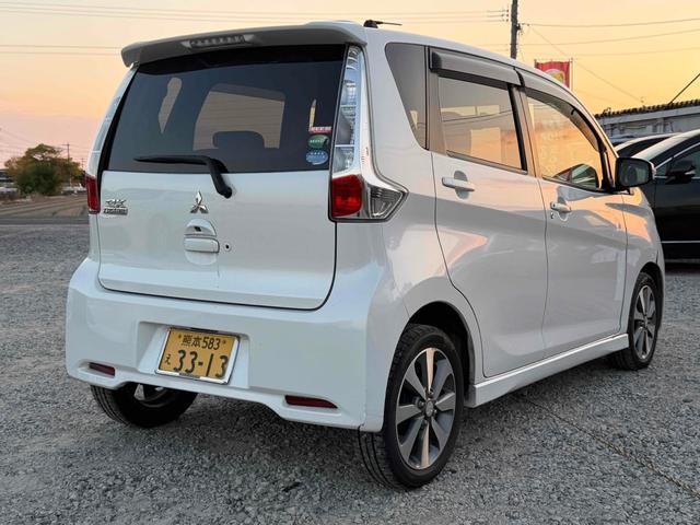 ｅＫカスタム Ｔ　ＥＴＣ　バックカメラ　ナビ　ＴＶ　ＨＩＤ　スマートキー　電動格納ミラー　ベンチシート　ＣＶＴ　盗難防止システム　ＡＢＳ　アルミホイール　衝突安全ボディ　エアコン　パワーステアリング　パワーウィンドウ（12枚目）