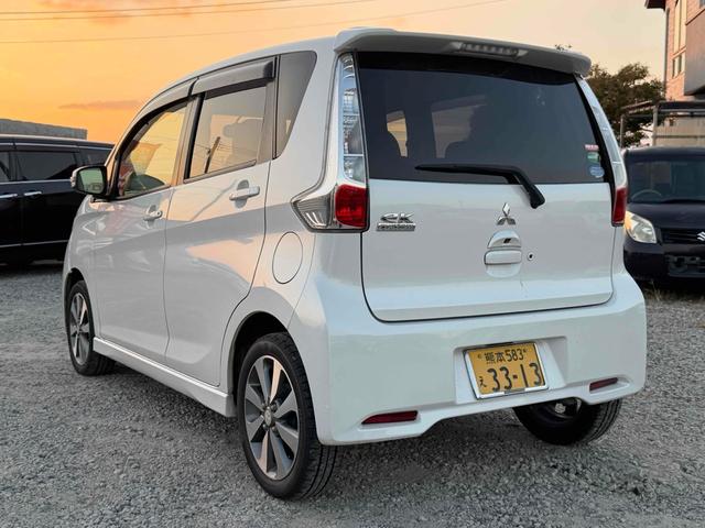 ｅＫカスタム Ｔ　ＥＴＣ　バックカメラ　ナビ　ＴＶ　ＨＩＤ　スマートキー　電動格納ミラー　ベンチシート　ＣＶＴ　盗難防止システム　ＡＢＳ　アルミホイール　衝突安全ボディ　エアコン　パワーステアリング　パワーウィンドウ（14枚目）