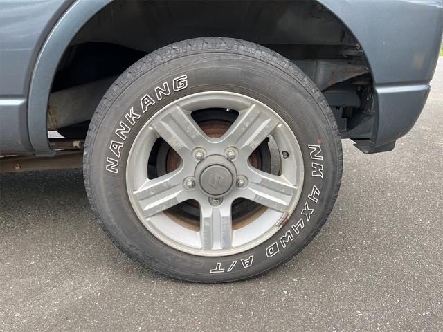 ジムニー ワイルドウインド 4WD ナビ TV キーレスエントリー 電動格納ミラー シートヒーター AT ABS ミュージックプレイヤー接続可 ルーフレール アルミホイール 衝突安全ボディ エアコン(20枚目)