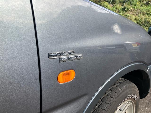 ジムニー ワイルドウインド 4WD ナビ TV キーレスエントリー 電動格納ミラー シートヒーター AT ABS ミュージックプレイヤー接続可 ルーフレール アルミホイール 衝突安全ボディ エアコン(51枚目)