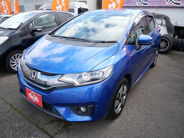 フィットハイブリッド Fパッケージ スマートキー プッシュスタート ETC ナビ バックモニター フルセグ オートエアコン トラクションコントロール パワーウインドウ(2枚目)