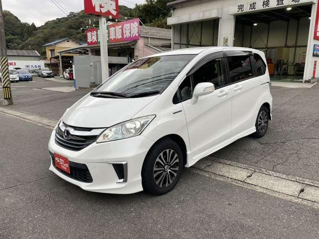 フリードハイブリッド ジャストセレクション 純正9インチナビ 両側電動ドア ETC ハーフレザーシート スマートキー セキュリティー アイドリングストップ HIDライト(6枚目)