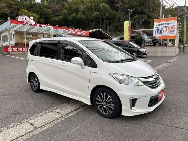 フリードハイブリッド ジャストセレクション 純正9インチナビ 両側電動ドア ETC ハーフレザーシート スマートキー セキュリティー アイドリングストップ HIDライト(12枚目)