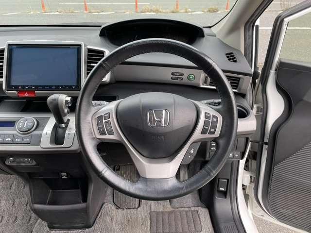 フリードハイブリッド ジャストセレクション 純正9インチナビ 両側電動ドア ETC ハーフレザーシート スマートキー セキュリティー アイドリングストップ HIDライト(21枚目)