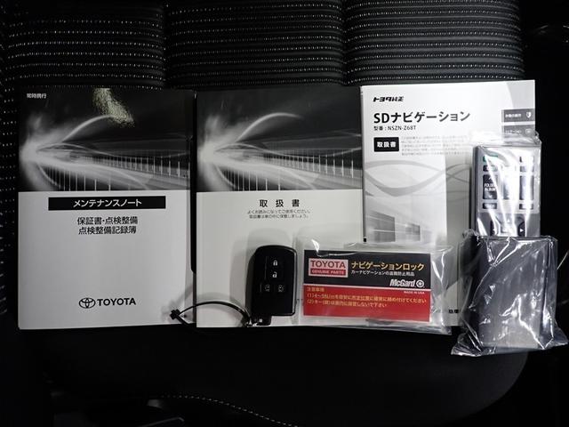 ヴォクシー ZS 煌II フルセグ メモリーナビ DVD再生 後席モニター バックカメラ 衝突被害軽減システム ETC 両側電動スライド LEDヘッドランプ ウオークスルー 乗車定員7人 3列シート 記録簿(36枚目)