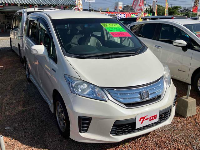 フリードハイブリッド ジャストセレクション　バックカメラ　ナビ　ＴＶ　オートクルーズコントロール　両側スライド・片側電動　オートライト　ＨＩＤ　エアロ　スマートキー　アイドリングストップ　電動格納ミラー　３列シート　ウォークスルー　ＣＶＴ（21枚目）