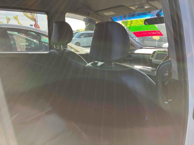 フリードハイブリッド ジャストセレクション　バックカメラ　ナビ　ＴＶ　オートクルーズコントロール　両側スライド・片側電動　オートライト　ＨＩＤ　エアロ　スマートキー　アイドリングストップ　電動格納ミラー　３列シート　ウォークスルー　ＣＶＴ（50枚目）