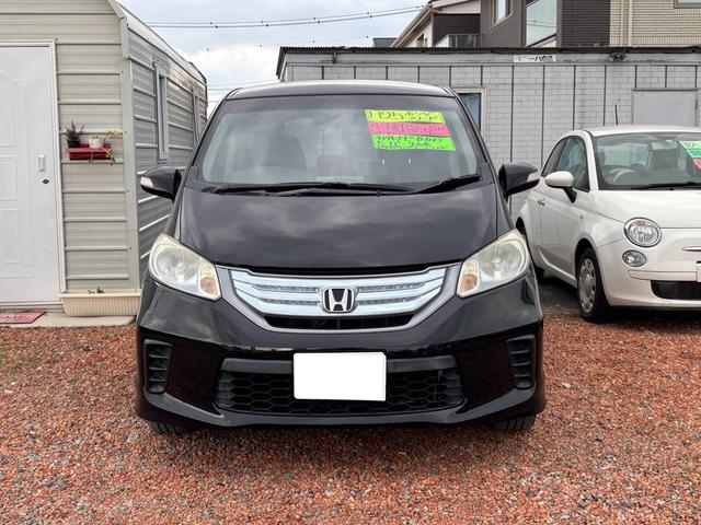 フリードハイブリッド ジャストセレクション セキュリティー 横滑り防止機能 衝突安全ボディ オートクルーズ エアバック キーレスエントリー PS ETC フルオートエアコン ABS パワーウィンドウ 運転席助手席エアバック アイドリングS(2枚目)