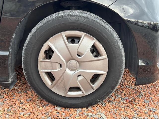 フリードハイブリッド ジャストセレクション セキュリティー 横滑り防止機能 衝突安全ボディ オートクルーズ エアバック キーレスエントリー PS ETC フルオートエアコン ABS パワーウィンドウ 運転席助手席エアバック アイドリングS(8枚目)