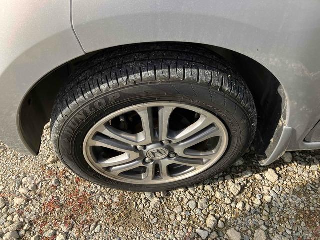 Ｎ－ＢＯＸ Ｇ・Ｌパッケージ　ＥＴＣ　両側スライド・片側電動　ＴＶ　スマートキー　アイドリングストップ　電動格納ミラー　ベンチシート　ＣＶＴ　盗難防止システム　ＡＢＳ　ＥＳＣ　ＣＤ　ＤＶＤ再生　ＵＳＢ　アルミホイール（25枚目）