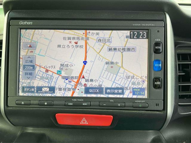 Ｎ－ＢＯＸ Ｇ・Ｌパッケージ　ＥＴＣ　両側スライド・片側電動　ナビ　ＴＶ　スマートキー　アイドリングストップ　電動格納ミラー　ベンチシート　ＣＶＴ　盗難防止システム　ＡＢＳ　ＥＳＣ　ＣＤ　ＤＶＤ再生　Ｂｌｕｅｔｏｏｔｈ（4枚目）
