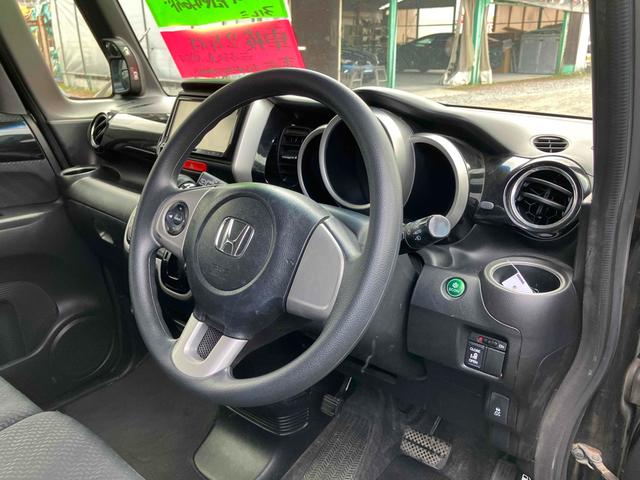 Ｎ－ＢＯＸカスタム Ｇ・Ｌパッケージ　ＥＴＣ　両側スライド・片側電動　ナビ　ＴＶ　オートライト　ＨＩＤ　スマートキー　アイドリングストップ　電動格納ミラー　ベンチシート　ＣＶＴ　盗難防止システム　ＡＢＳ　ＥＳＣ　ＣＤ　ＤＶＤ再生（49枚目）