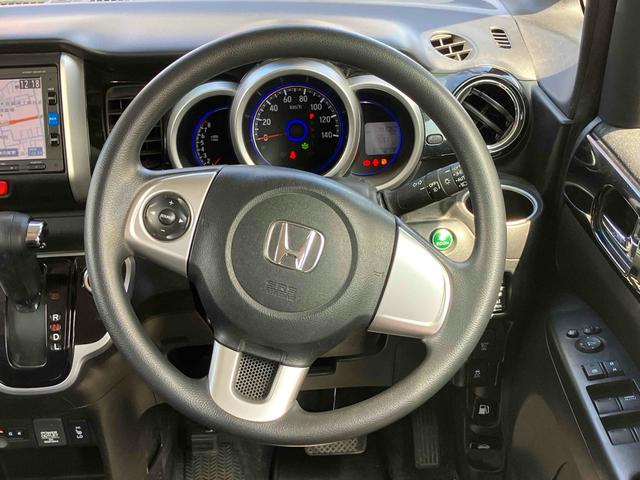 Ｎ－ＢＯＸカスタム Ｇ　ＳＳブラックスタイルパッケージ　ＥＴＣ　バックカメラ　両側電動スライドドア　ナビ　ＴＶ　オートライト　ＨＩＤ　スマートキー　アイドリングストップ　電動格納ミラー　シートヒーター　ベンチシート　ＣＶＴ　盗難防止システム　ＡＢＳ　ＥＳＣ（3枚目）