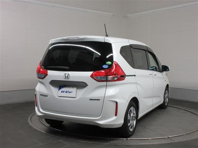 フリードハイブリッド ハイブリッド・Ｇホンダセンシング　フルセグ　メモリーナビ　ＤＶＤ再生　バックカメラ　衝突被害軽減システム　ＥＴＣ　ドラレコ　両側電動スライド　ＬＥＤヘッドランプ　ウオークスルー　乗車定員６人　３列シート（3枚目）