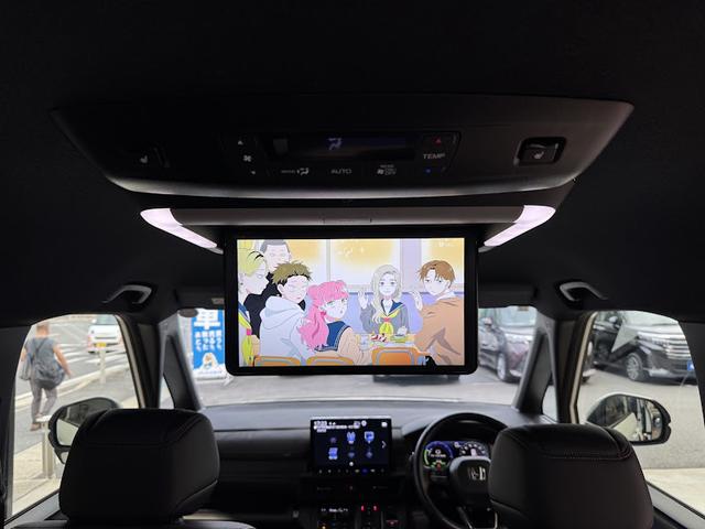 ｅ：ＨＥＶスパーダ　プレミアムライン　純正１５．６インチフリップダウンモニター　フルセグＴＶ　Ｂｌｕｅｔｏｏｔｈ　全方位モニター　両側パワースライドドア　ホンダセンシング　アダプティブクルーズコントロール　ＥＴＣ車載器　ＬＥＤヘッドライト（画像15）