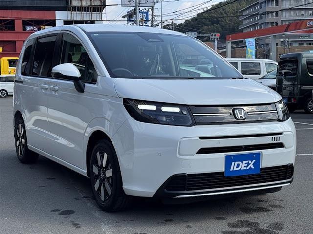 フリード ｅ：ＨＥＶエアー　ＥＸ　届出済未使用車　両側パワースライドドア　ホンダセンシング　純正ディスプレイオーディオ　全方位モニター　フルセグＴＶ　Ｂｌｕｅｔｏｏｔｈ　アダプティブクルーズコントロール（8枚目）