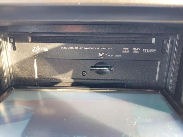 ＮＶ１００クリッパーバン ＤＸ　ハイルーフ　５ＡＧＳ車　４ＷＤ　オートマ　フル装備　ＤＶＤナビ　ワンセグ　社外タコメーター　ＬＥＤライト　ＥＴＣ　リヤスポイラー　社外アルミ付（17枚目）