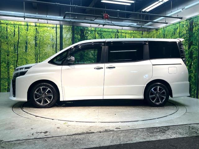 ヴォクシー ＺＳ　煌ＩＩ　禁煙車　両側電動スライドドア　フリップダウンモニター　衝突軽減装置　純正９インチナビ　フルセグ　バックカメラ　ＥＴＣ　Ｂｌｕｅｔｏｏｔｈ再生　ＬＥＤヘッドライト　ＬＥＤフォグ　クルーズコントロール（27枚目）