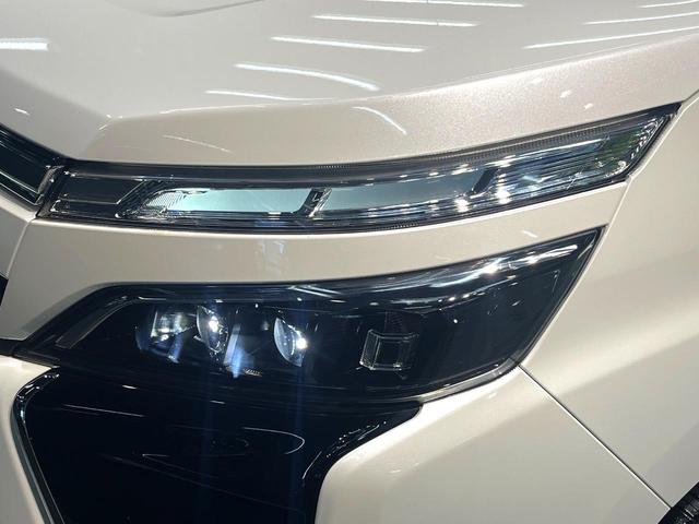 ヴォクシー ＺＳ　煌ＩＩ　禁煙車　両側電動スライドドア　フリップダウンモニター　衝突軽減装置　純正９インチナビ　フルセグ　バックカメラ　ＥＴＣ　Ｂｌｕｅｔｏｏｔｈ再生　ＬＥＤヘッドライト　ＬＥＤフォグ　クルーズコントロール（31枚目）