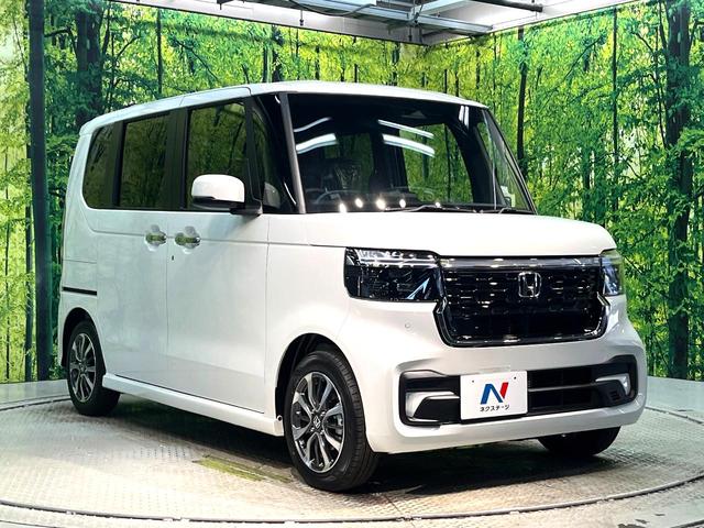 Ｎ－ＢＯＸカスタム ベースグレード　届出済未使用車　両側電動ドア　ホンダセンシング　アダプティブクルーズ　パーキングセンサー　スマートキー　ＬＥＤヘッド　オートハイビーム　車線逸脱警報　オートエアコン　純正１４アルミ　誤発進抑制機能（16枚目）