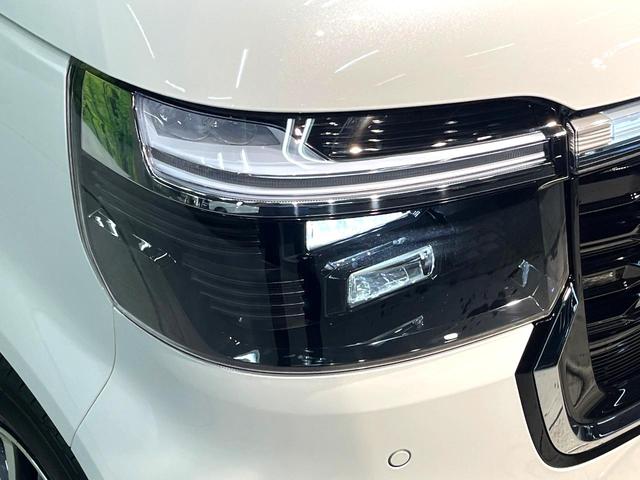 Ｎ－ＢＯＸカスタム ベースグレード　届出済未使用車　両側電動ドア　ホンダセンシング　アダプティブクルーズ　パーキングセンサー　スマートキー　ＬＥＤヘッド　オートハイビーム　車線逸脱警報　オートエアコン　純正１４アルミ　誤発進抑制機能（24枚目）