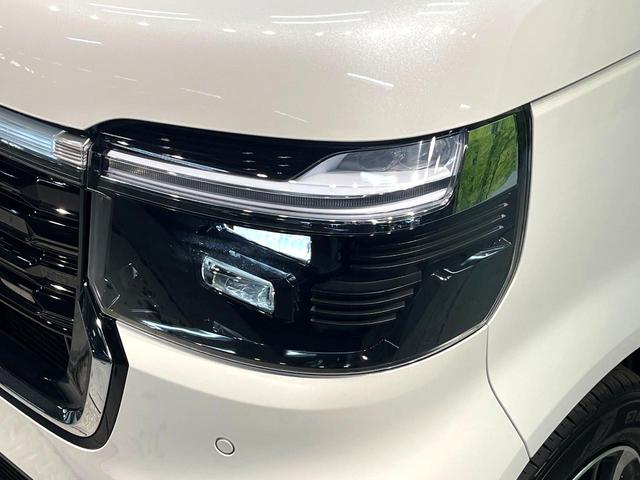 Ｎ－ＢＯＸカスタム ベースグレード　届出済未使用車　両側電動ドア　ホンダセンシング　アダプティブクルーズ　パーキングセンサー　スマートキー　ＬＥＤヘッド　オートハイビーム　車線逸脱警報　オートエアコン　純正１４アルミ　誤発進抑制機能（25枚目）
