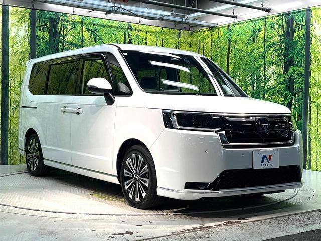 ステップワゴン ｅ：ＨＥＶスパーダ　プレミアムライン　禁煙車　両側電動ドア　後席モニター　全周囲カメラ　衝突被害軽減システム　レーダークルーズ　　電動リアゲート　ハーフレザーシート　ドラレコ　コーナーセンサー　スマートキー　ＬＥＤヘッド　ビルトインＥＴＣ（17枚目）