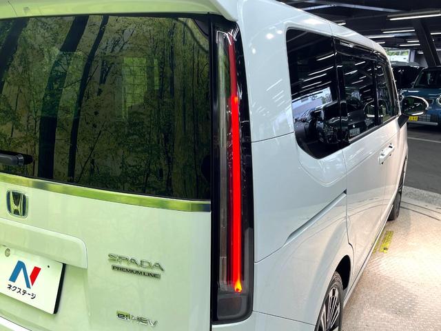 ステップワゴン ｅ：ＨＥＶスパーダ　プレミアムライン　禁煙車　両側電動ドア　後席モニター　全周囲カメラ　衝突被害軽減システム　レーダークルーズ　　電動リアゲート　ハーフレザーシート　ドラレコ　コーナーセンサー　スマートキー　ＬＥＤヘッド　ビルトインＥＴＣ（57枚目）