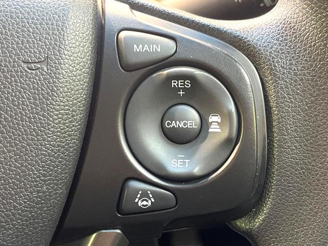 フリードハイブリッド ハイブリッド・Gホンダセンシング 禁煙車 両側電動スライドドア 純正SDナビ バックカメラ 衝突被害軽減システム レーダークルーズコントロール スマートキー LEDヘッド ETC 車線逸脱警報 オートライト オートエアコン(7枚目)