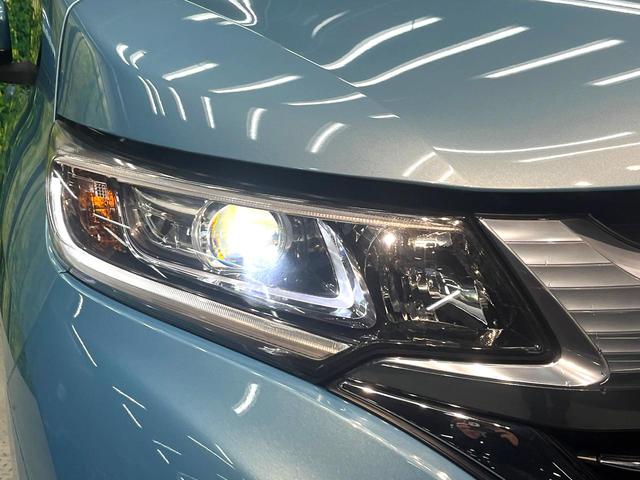 フリードハイブリッド ハイブリッド・Gホンダセンシング 禁煙車 両側電動スライドドア 純正SDナビ バックカメラ 衝突被害軽減システム レーダークルーズコントロール スマートキー LEDヘッド ETC 車線逸脱警報 オートライト オートエアコン(14枚目)