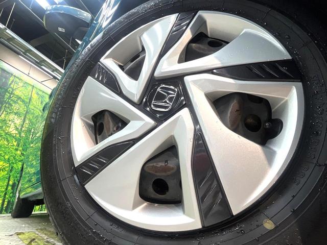 フリードハイブリッド ハイブリッド・Gホンダセンシング 禁煙車 両側電動スライドドア 純正SDナビ バックカメラ 衝突被害軽減システム レーダークルーズコントロール スマートキー LEDヘッド ETC 車線逸脱警報 オートライト オートエアコン(15枚目)