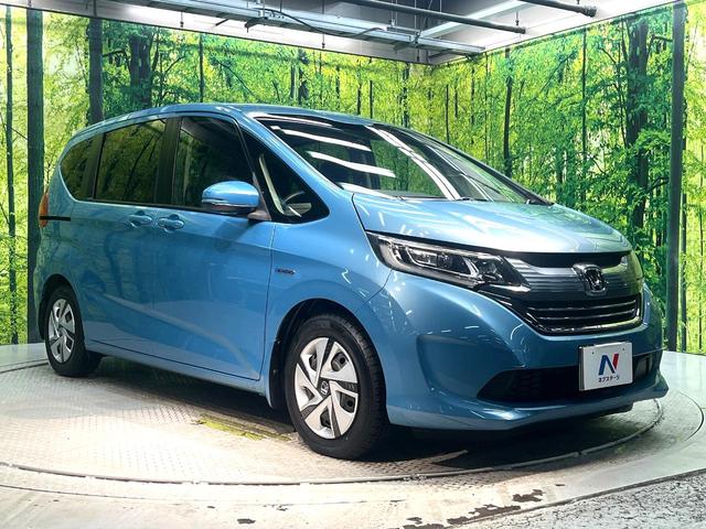 フリードハイブリッド ハイブリッド・Gホンダセンシング 禁煙車 両側電動スライドドア 純正SDナビ バックカメラ 衝突被害軽減システム レーダークルーズコントロール スマートキー LEDヘッド ETC 車線逸脱警報 オートライト オートエアコン(18枚目)