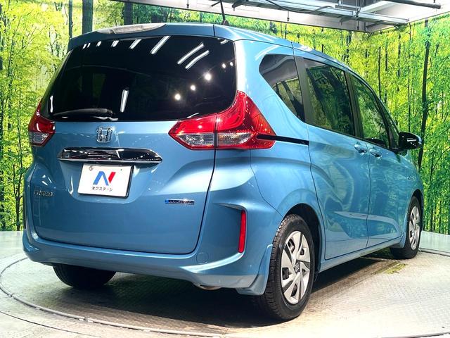 フリードハイブリッド ハイブリッド・Gホンダセンシング 禁煙車 両側電動スライドドア 純正SDナビ バックカメラ 衝突被害軽減システム レーダークルーズコントロール スマートキー LEDヘッド ETC 車線逸脱警報 オートライト オートエアコン(19枚目)