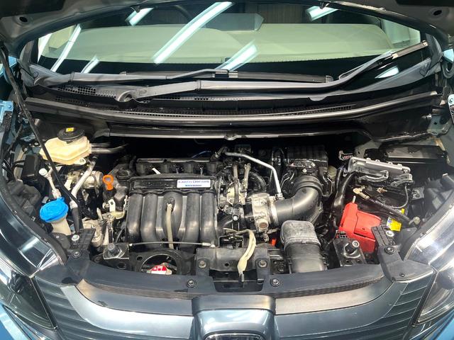 フリードハイブリッド ハイブリッド・Gホンダセンシング 禁煙車 両側電動スライドドア 純正SDナビ バックカメラ 衝突被害軽減システム レーダークルーズコントロール スマートキー LEDヘッド ETC 車線逸脱警報 オートライト オートエアコン(20枚目)