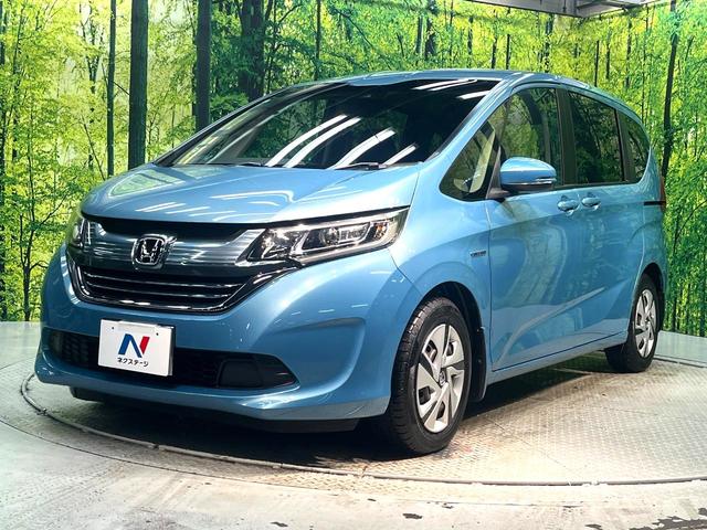 フリードハイブリッド ハイブリッド・Gホンダセンシング 禁煙車 両側電動スライドドア 純正SDナビ バックカメラ 衝突被害軽減システム レーダークルーズコントロール スマートキー LEDヘッド ETC 車線逸脱警報 オートライト オートエアコン(26枚目)