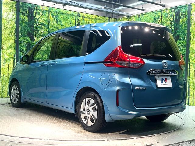 フリードハイブリッド ハイブリッド・Gホンダセンシング 禁煙車 両側電動スライドドア 純正SDナビ バックカメラ 衝突被害軽減システム レーダークルーズコントロール スマートキー LEDヘッド ETC 車線逸脱警報 オートライト オートエアコン(29枚目)