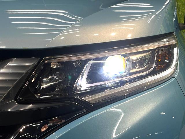 フリードハイブリッド ハイブリッド・Gホンダセンシング 禁煙車 両側電動スライドドア 純正SDナビ バックカメラ 衝突被害軽減システム レーダークルーズコントロール スマートキー LEDヘッド ETC 車線逸脱警報 オートライト オートエアコン(32枚目)