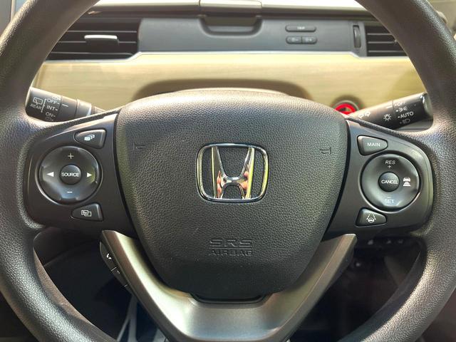 フリードハイブリッド ハイブリッド・Gホンダセンシング 禁煙車 両側電動スライドドア 純正SDナビ バックカメラ 衝突被害軽減システム レーダークルーズコントロール スマートキー LEDヘッド ETC 車線逸脱警報 オートライト オートエアコン(56枚目)