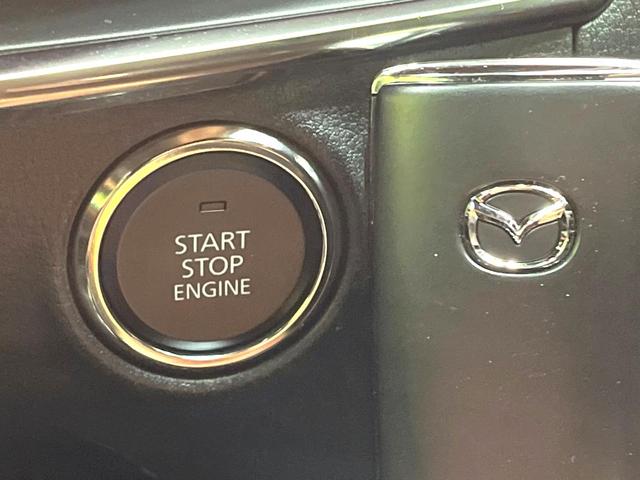 MAZDA3ファストバック 20Sバーガンディ セレクション 禁煙車 10インチSDナビ バックカメラ BOSEサウンド 衝突被害軽減システム レーダークルーズ レザーシート パワーシート コーナーセンサー スマートキー LEDヘッド ビルトインETC(6枚目)