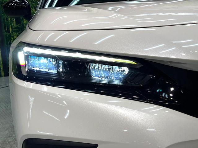 シビック e:HEV 禁煙車 9インチナビ バックカメラ BOSEサウンド 衝突被害軽減システム レーダークルーズ レザーシート ドラレコ コーナーセンサー LEDヘッド ETC2.0 オートハイビーム 車線逸脱警報(28枚目)