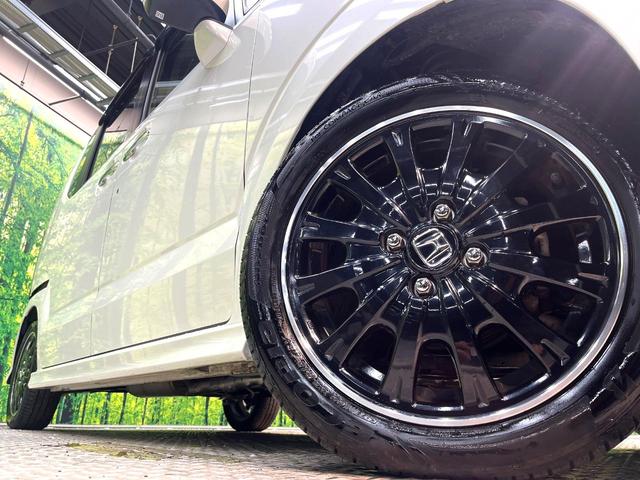 N-BOXカスタム G ターボSSブラックスタイルパッケージ ターボ 両側電動ドア 純正ナビ バックカメラ 衝突軽減 禁煙車 ハーフレザーシート スマートキー HIDヘッド LEDフォグ ETC クルコン オートライト オートエアコン 純正15インチアルミ(13枚目)