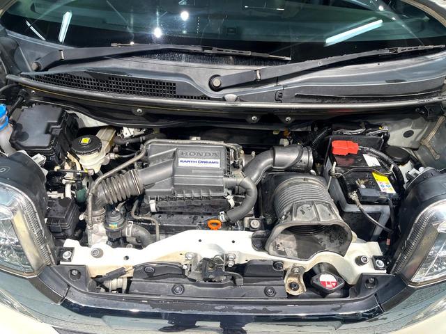 N-BOXカスタム G ターボSSブラックスタイルパッケージ ターボ 両側電動ドア 純正ナビ バックカメラ 衝突軽減 禁煙車 ハーフレザーシート スマートキー HIDヘッド LEDフォグ ETC クルコン オートライト オートエアコン 純正15インチアルミ(18枚目)