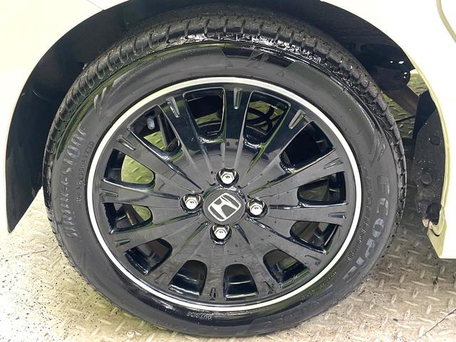 N-BOXカスタム G ターボSSブラックスタイルパッケージ ターボ 両側電動ドア 純正ナビ バックカメラ 衝突軽減 禁煙車 ハーフレザーシート スマートキー HIDヘッド LEDフォグ ETC クルコン オートライト オートエアコン 純正15インチアルミ(34枚目)