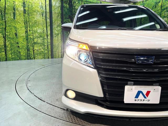 ノア ハイブリッドＧ　禁煙車　電動スライドドア　純正ナビ　後席モニター　バックカメラ　ドラレコ　ＥＴＣ　スマートキー　ＨＩＤヘッド　ビルトイン　クルコン　オートライト　デュアルエアコン　ＤＶＤ再生（13枚目）
